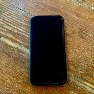 iPhone 8 Unlocked 64 gb (used, good condition). Faux leather case included.